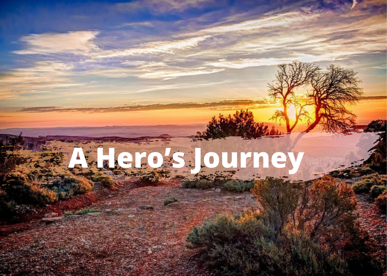 Text reals A Hero's Journey in front desert sunset