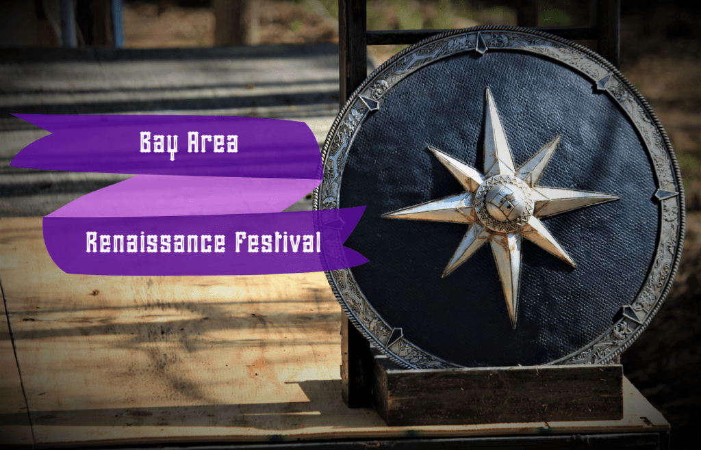 Text Bay Area Renaissance Festival reads over a shield with a starburst design