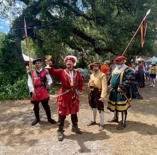 The King of the faire with his entourage 