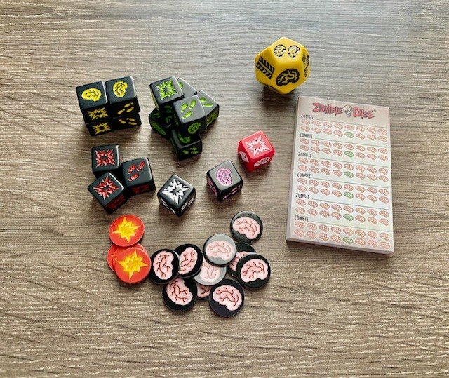 All contents for all versions of Zombie Dice are included in the box. Dice, Tokens and Tracker included.