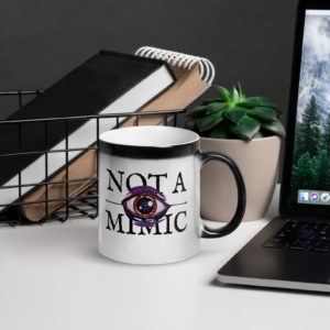 mug with text that reads "not a mimic"
