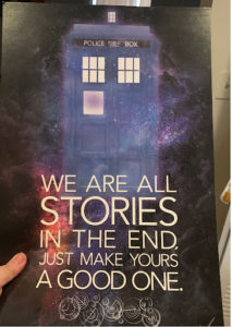 Print of blue police call box with text reading "We are all stories in the end. Just make yours a good one."