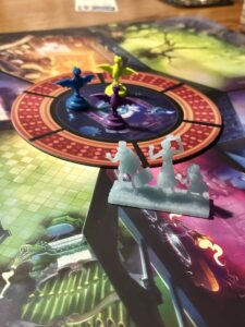 A close up of the center of the board, picturing the 3 hitchhiking ghosts in the front of the photo. 